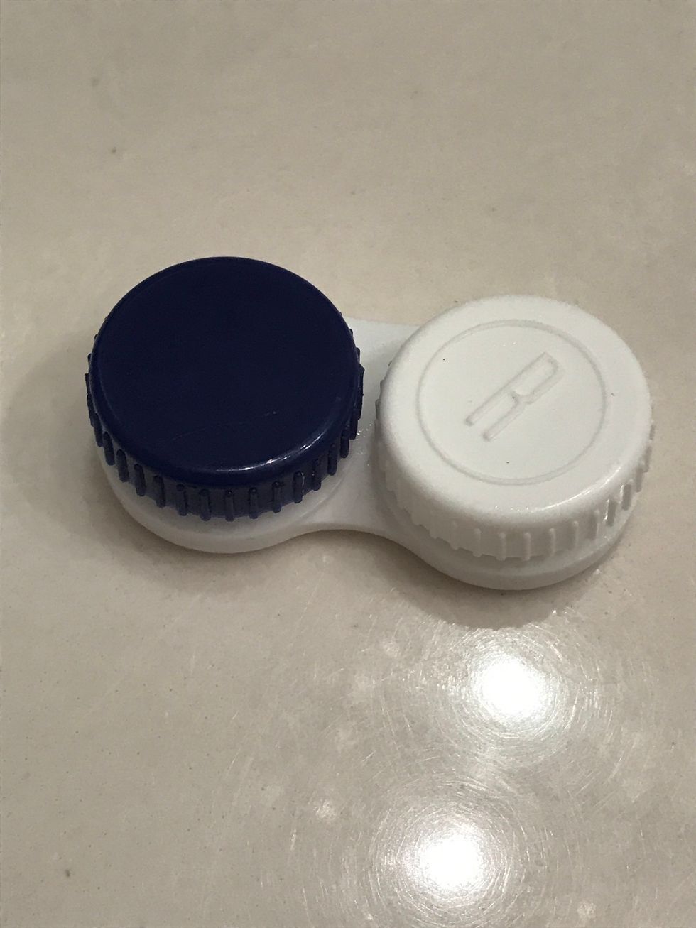 Finally, close the contact case and put it away until the next morning.