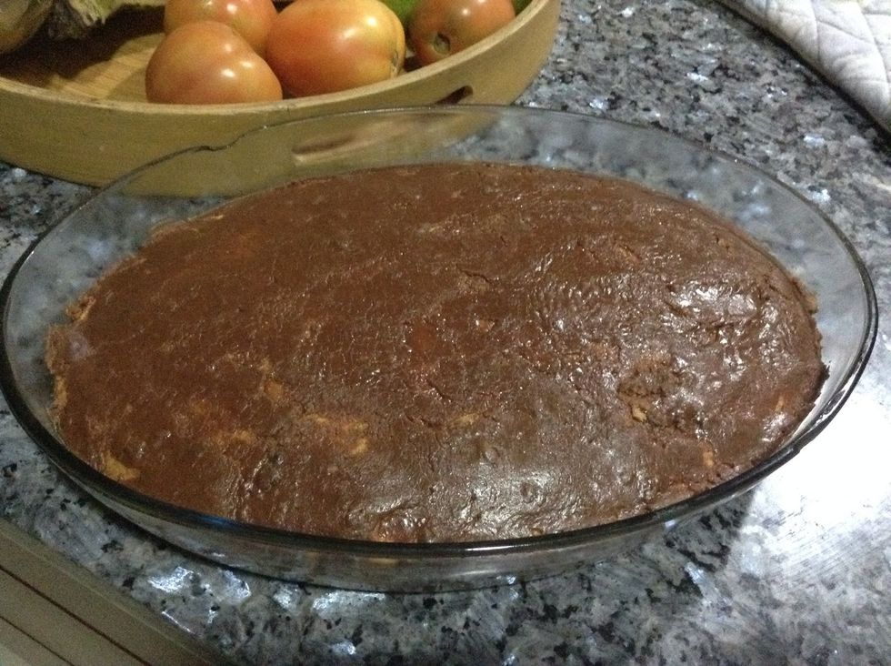 Finally cover the bake with the chocolate frosting and it is ready to be eaten!!