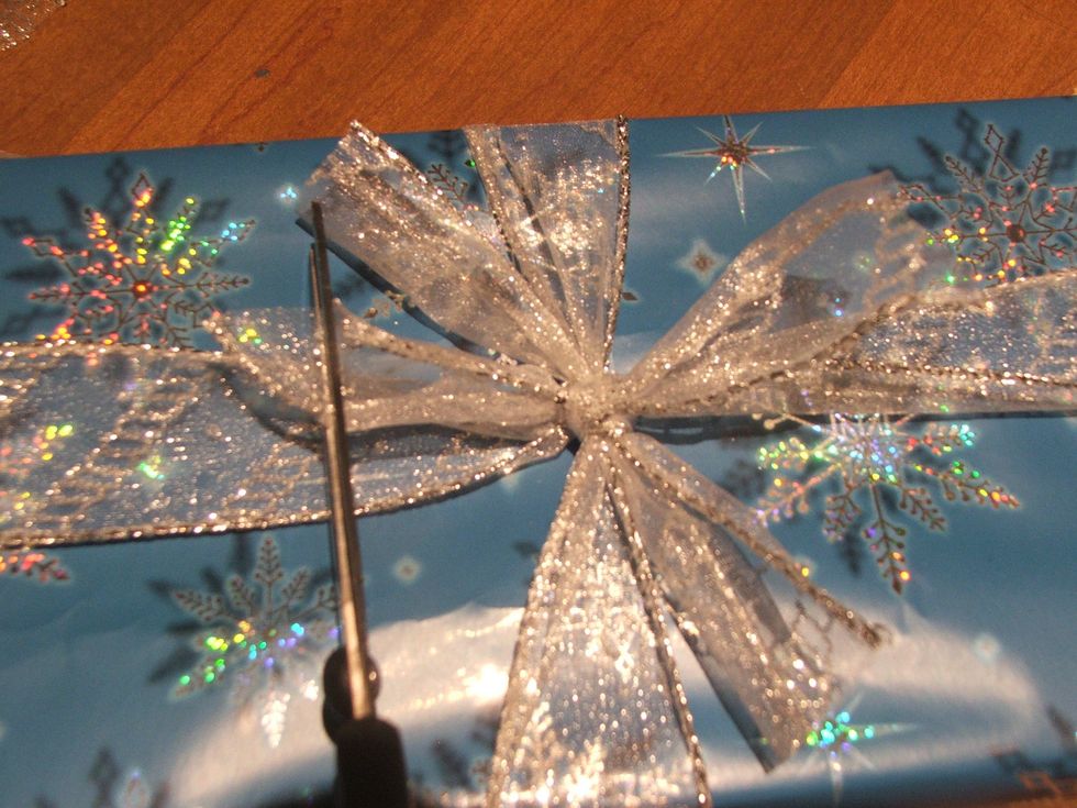 Finally cut the ends of the Ribbon to create a star.