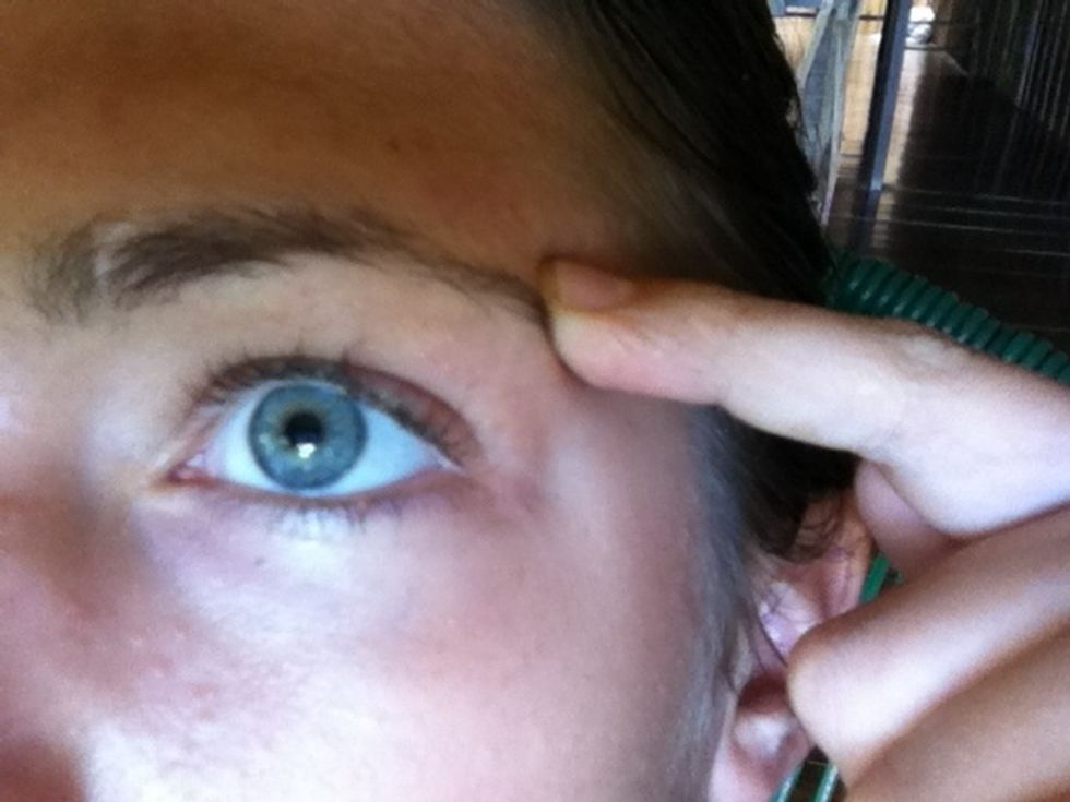 Finally find a spot located where your brow ends, there is a sort of a nook or corner created by the brow bone and the bone of your forehead and that is where the acupuncture spot is. Press a while.