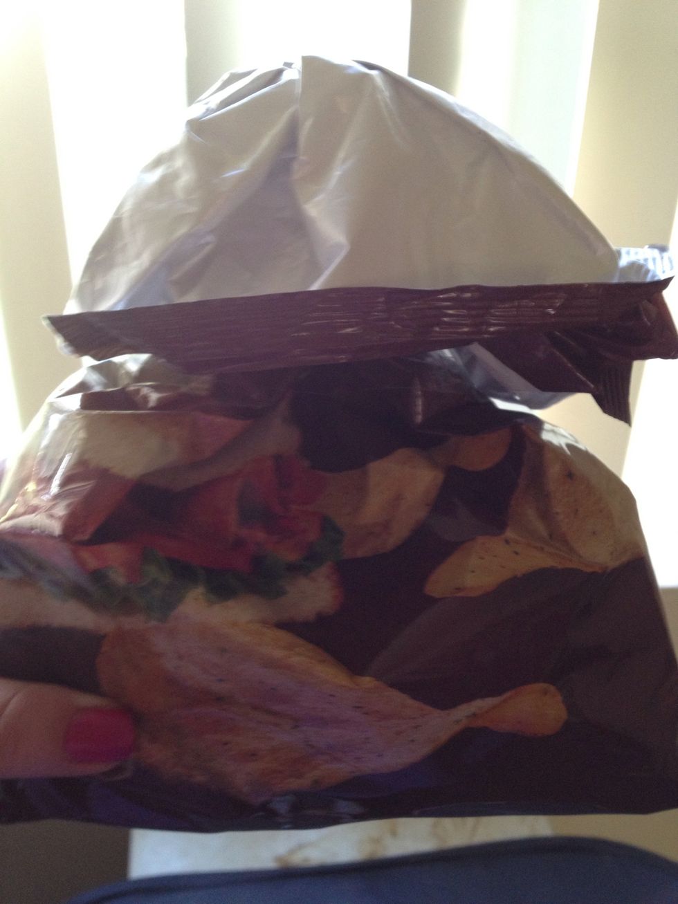 Finally fold the part you just pulled through the cap down over the bottle.