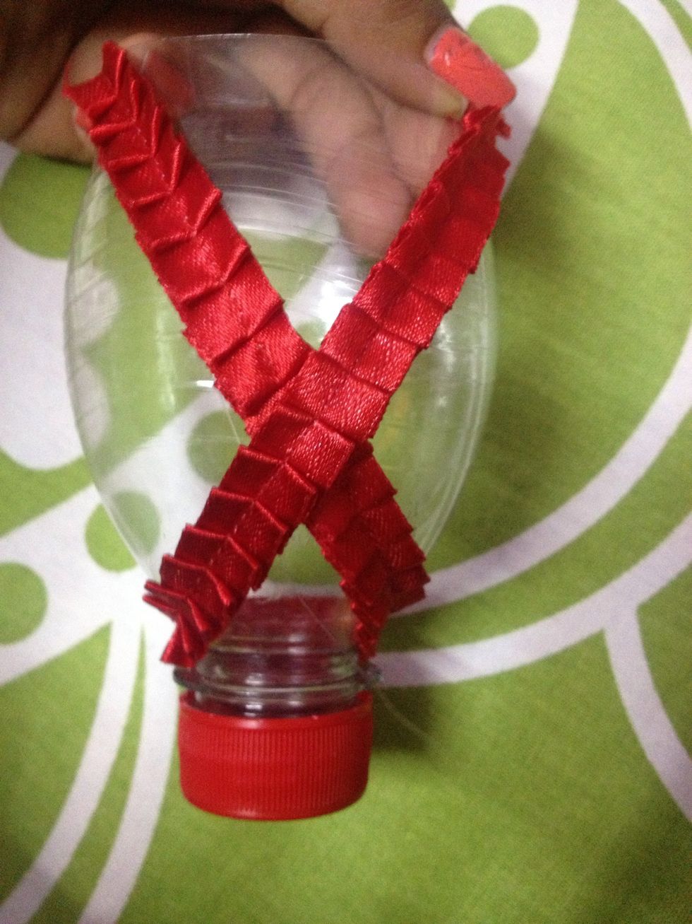 Finally make a cross in the front after rotation and them again fix the other end of frill with glue