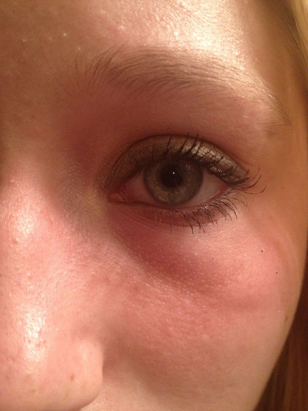 Finally mascara. I twist the brush to help curl the lashes. Don't forget bottom lashes and corners!