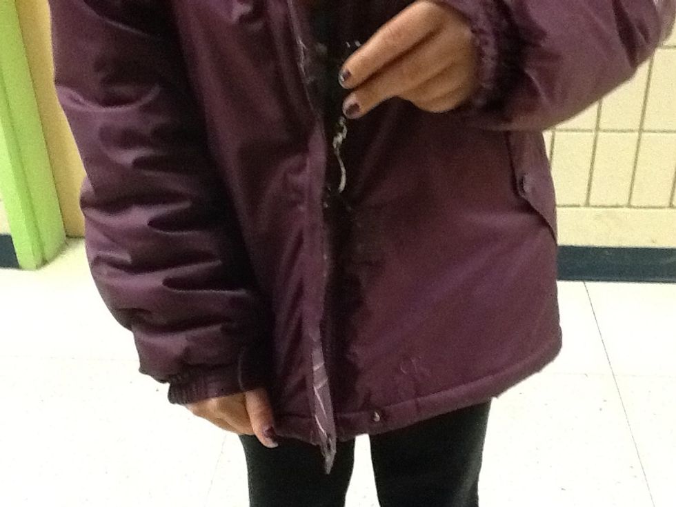 Finally pull your zipper up and push your coat down.