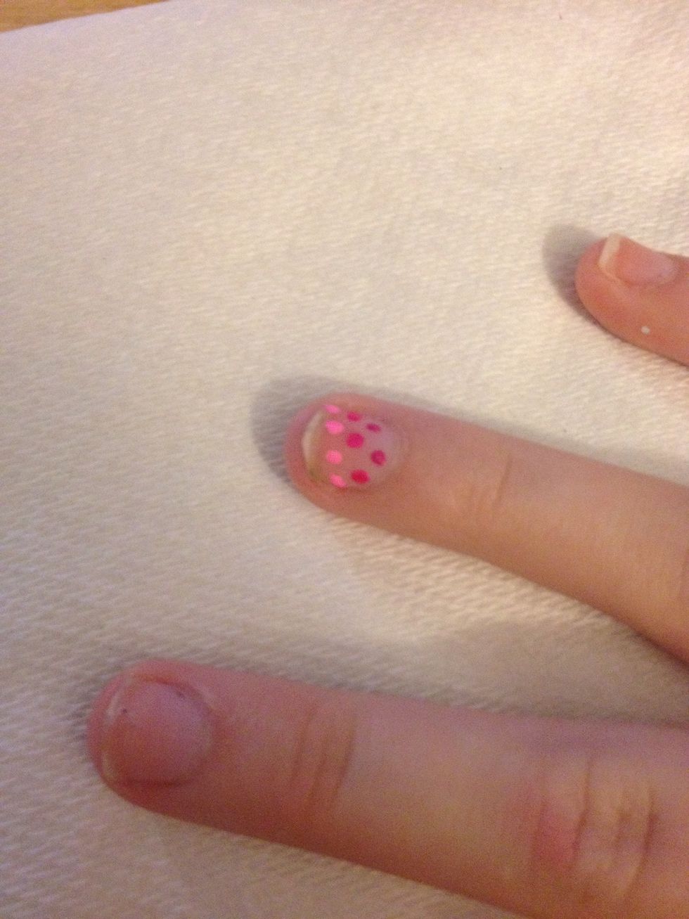 Finally put your last lightest color (4 dots for me) below your last three dots.