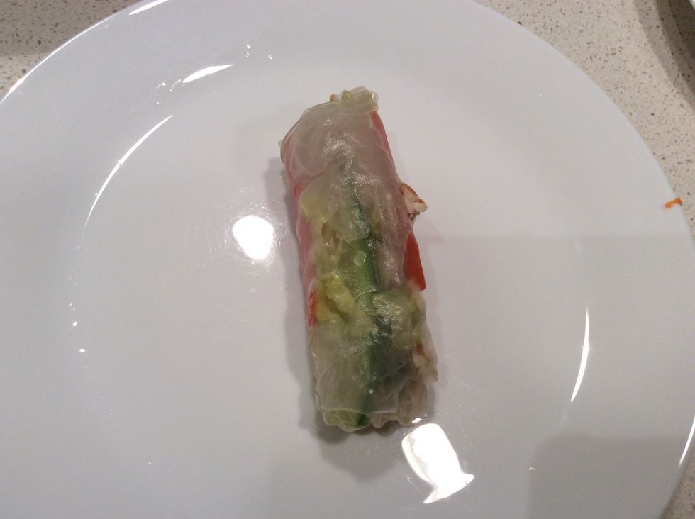 Finally roll it over one more time so the rice paper covers all the filling