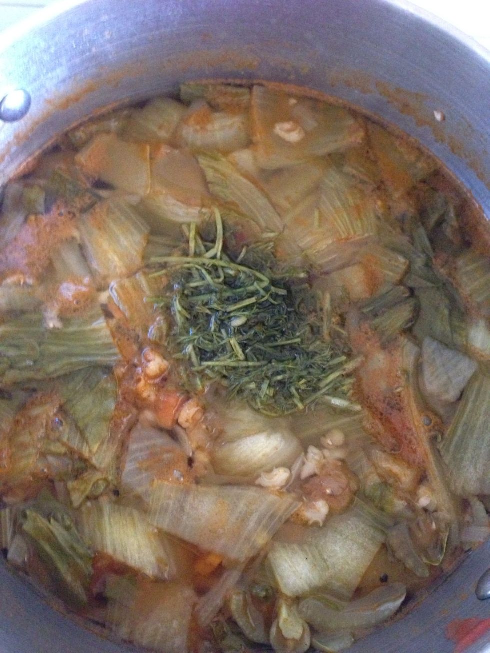 Finally roughly chop the bok choy and toss it in the pot. Cook for 5 minutes. Then take your dill, chop it and add it to the soup. Add salt and pepper to taste and you're done!