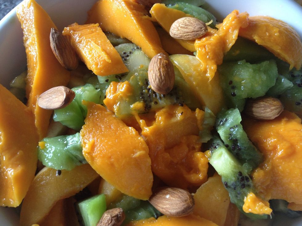Finally sprinkle with a handful (1tblspn) of unsalted almonds and/or pistachio nuts to complete this delicious, healthy and quick breakfast fruit salad.
