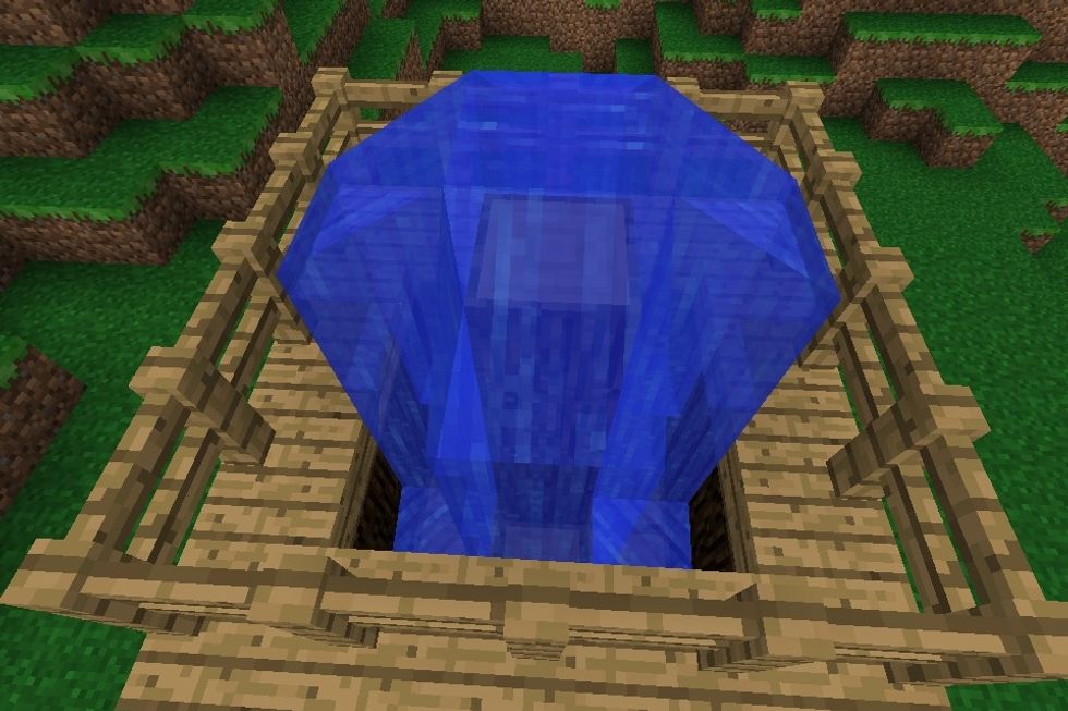 Finally you then place water at the block at the top then it should all fall down the sides