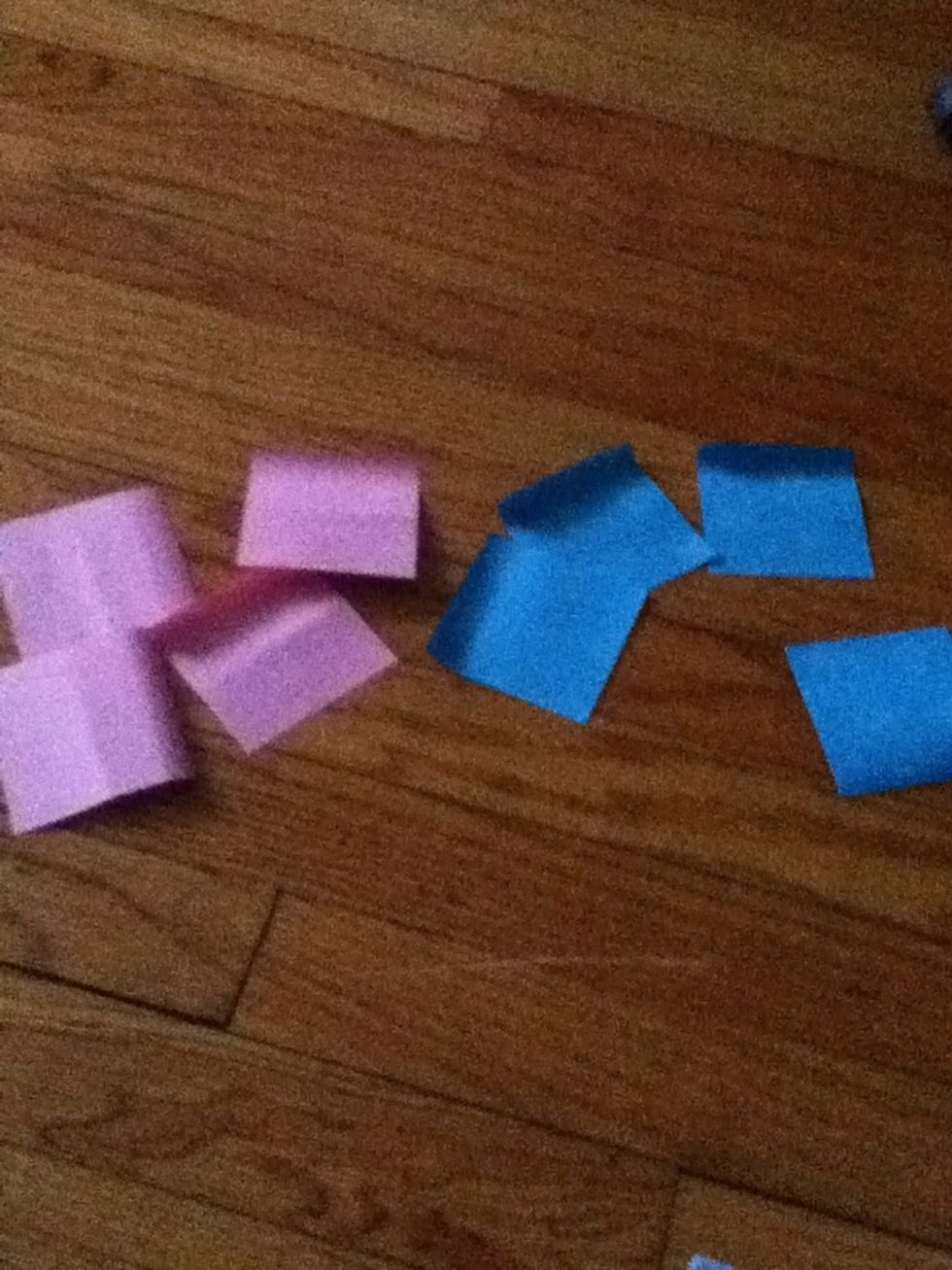 Find 8 sticky notes. 4 of one color and 4 more of another. If you want a one-colored ninja star, just find 8 sticky notes of the same color instead.