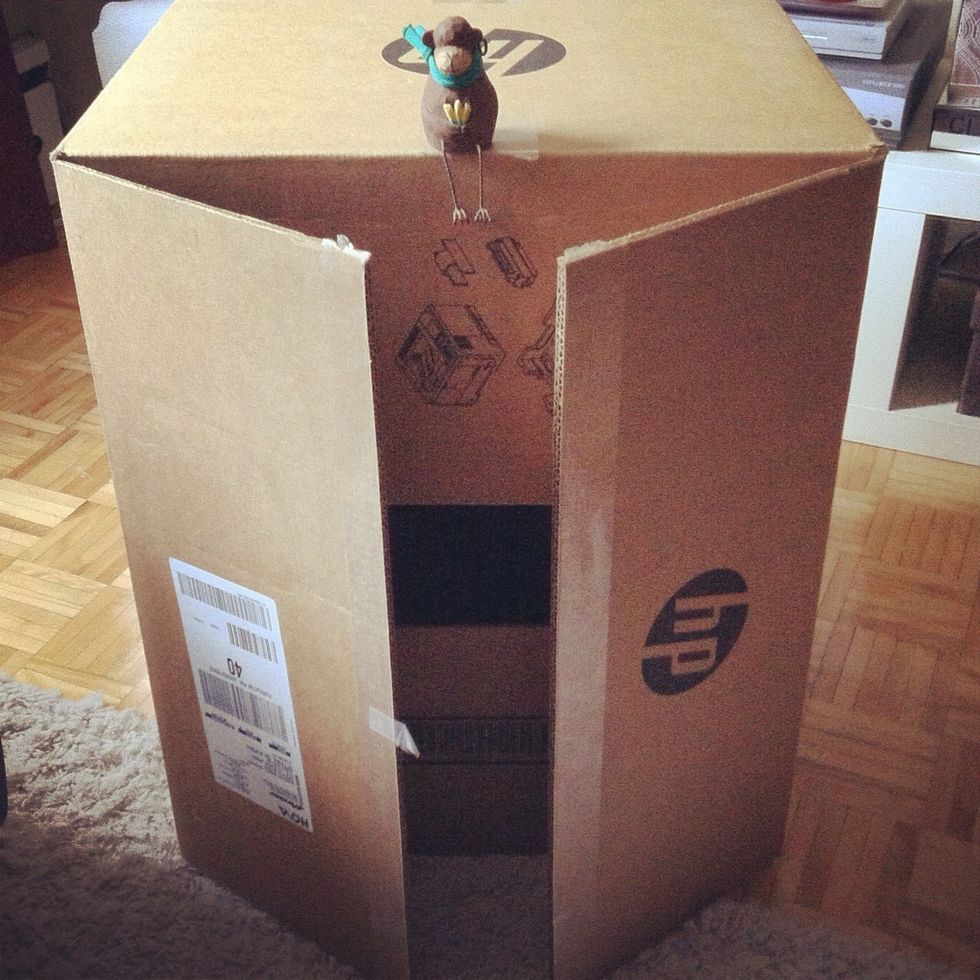 Find a cardboard box big enough to fit the items that you wish to photograph. Computer boxes are great - sturdy & come in large sizes (ahem...and you may be able to sneak one from the office).