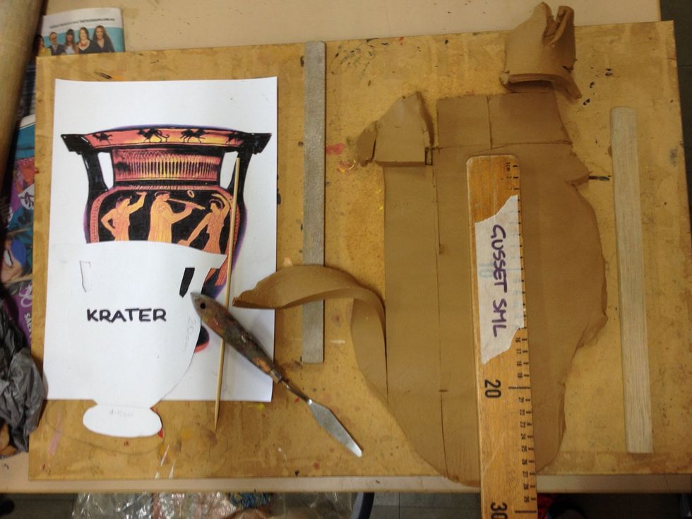 Find a ruler, piece of wood etc to cut your remaining sides and base. The ruler pictured is 4.5cm wide. Cut two pieces your maximum side length and one your minimum width (see Step 2).