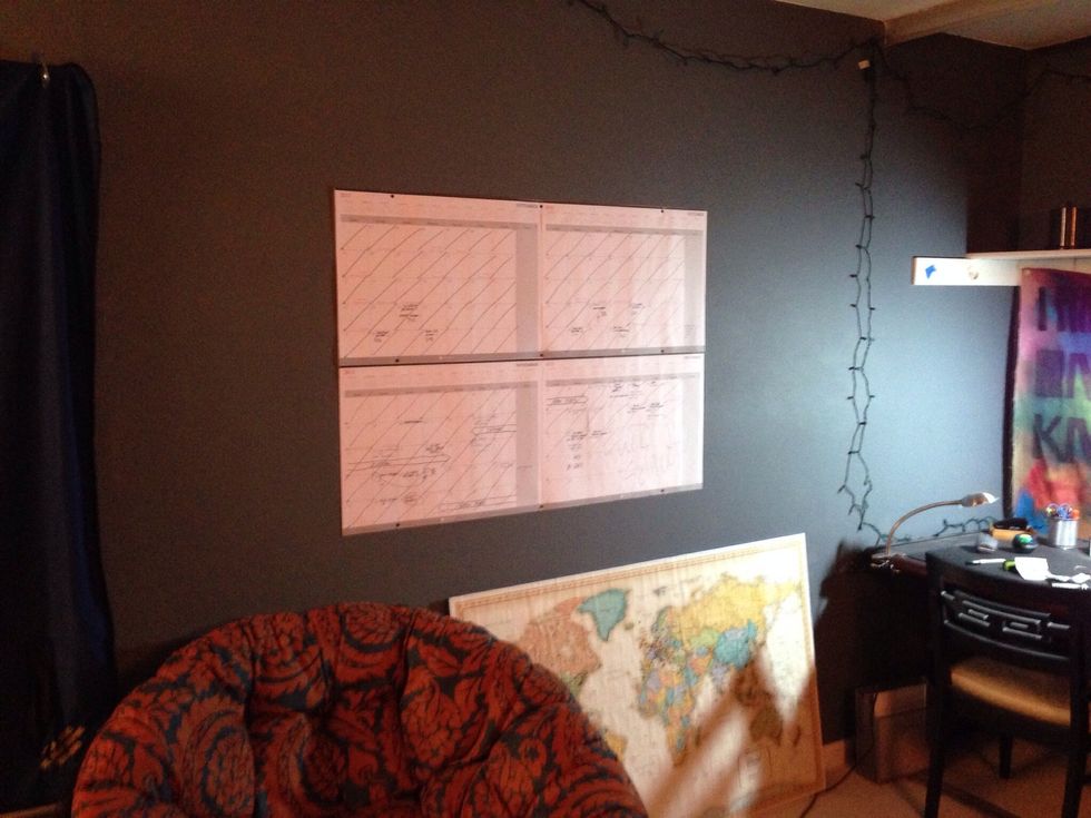 Find a spot where you'd like to hang your map. In this case im getting rid of my calendar from last semester and putting this map in its place.