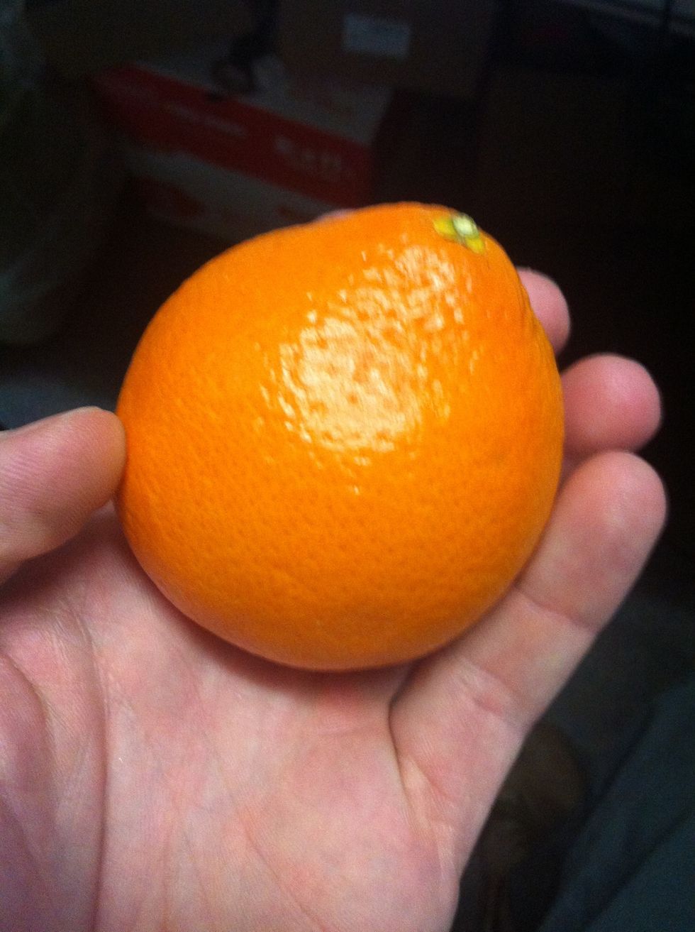 Find a suitable orange and hold it in your non dominant hand