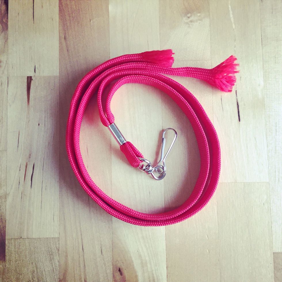 Find an old lanyard and cut it from the middle.