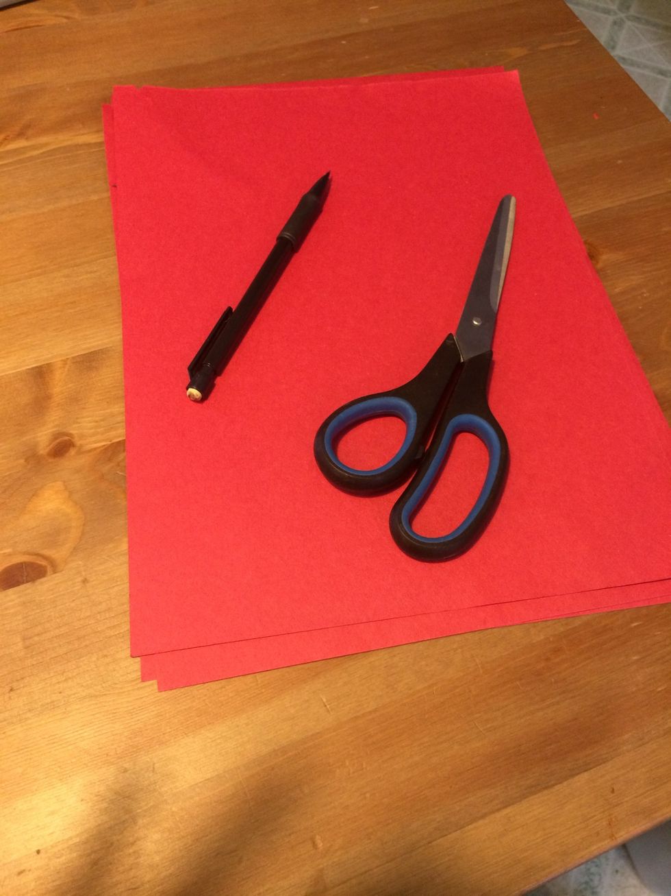 Find construction paper in a color of your choice. Each sheet can make four valentines.