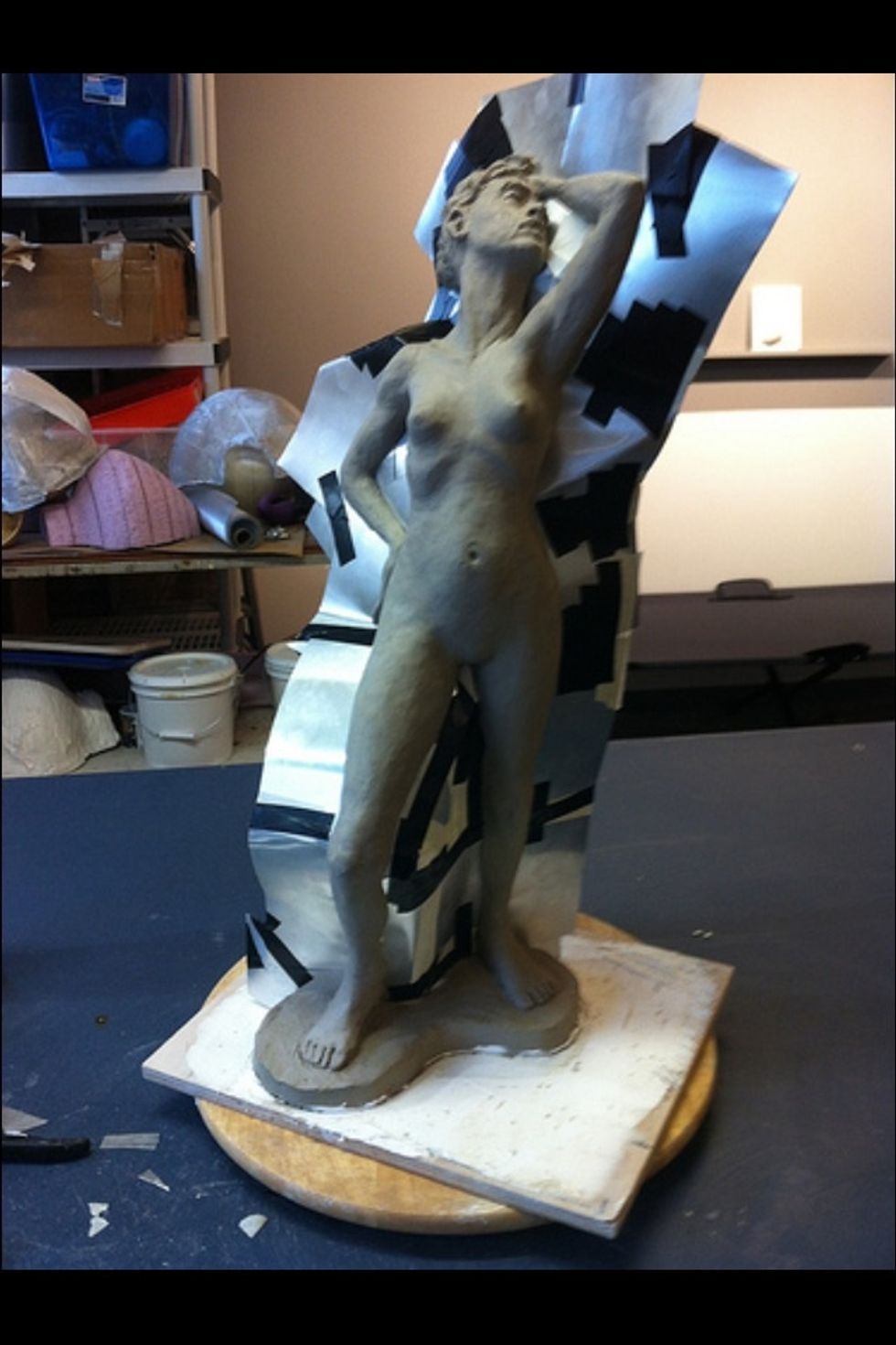 Find parting lines and insert aluminum shims. Tape the shims together and fill in gaps with electrical tape. The shim line should be smooth and continuous.