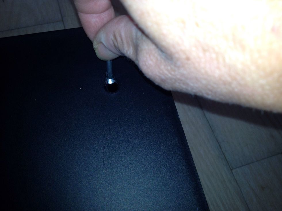 Find screw that fits in the hole.