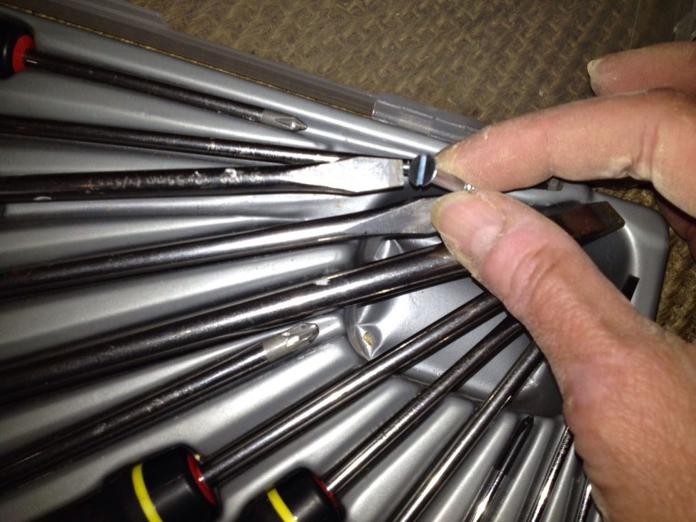 Find screwdriver that fits your type of screw.