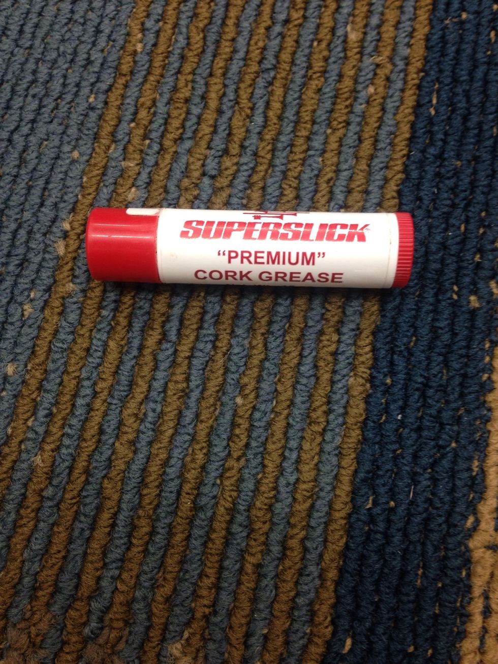 Find some "premium" cork grease.