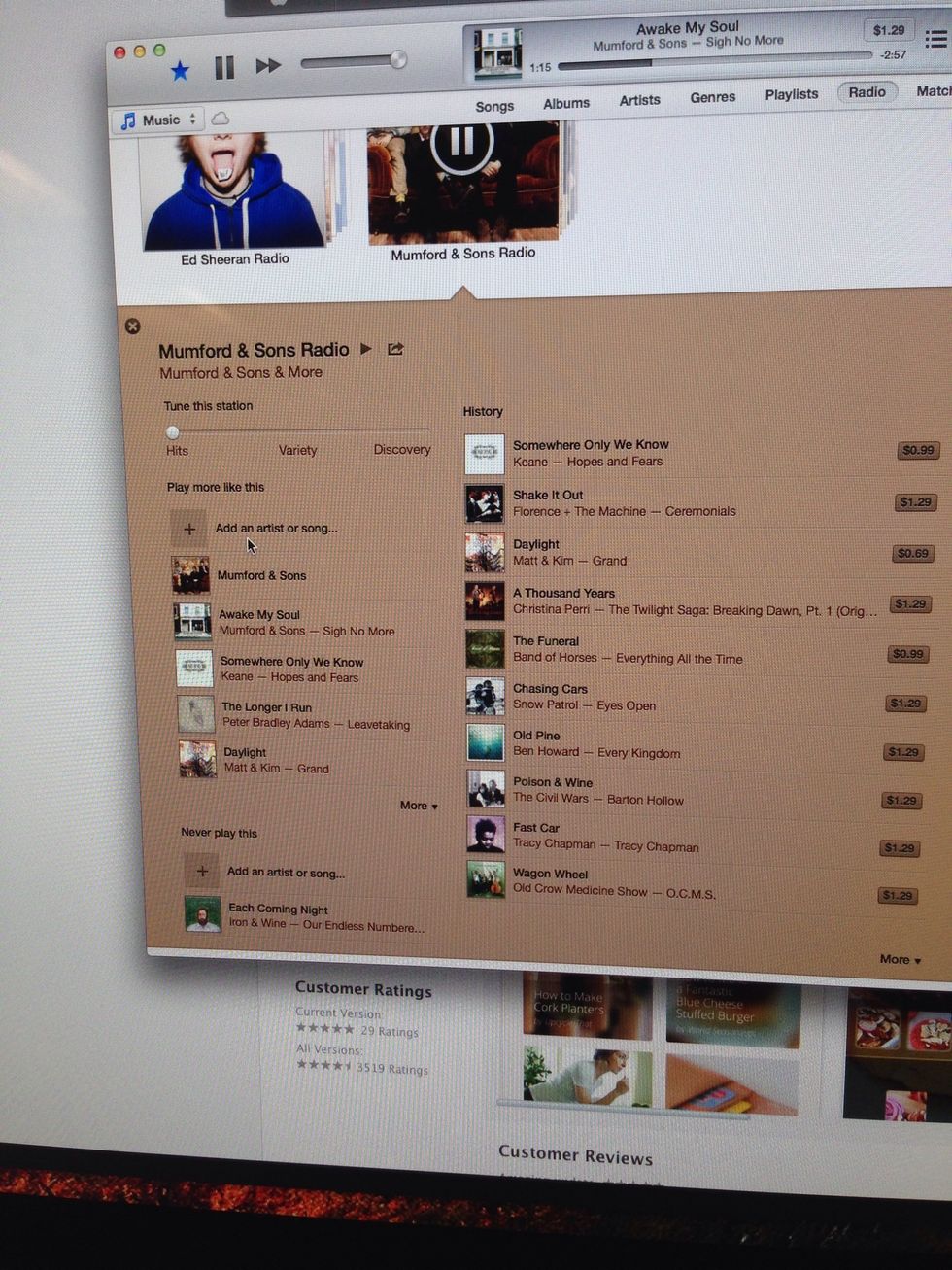 Find the add songs or artists button.