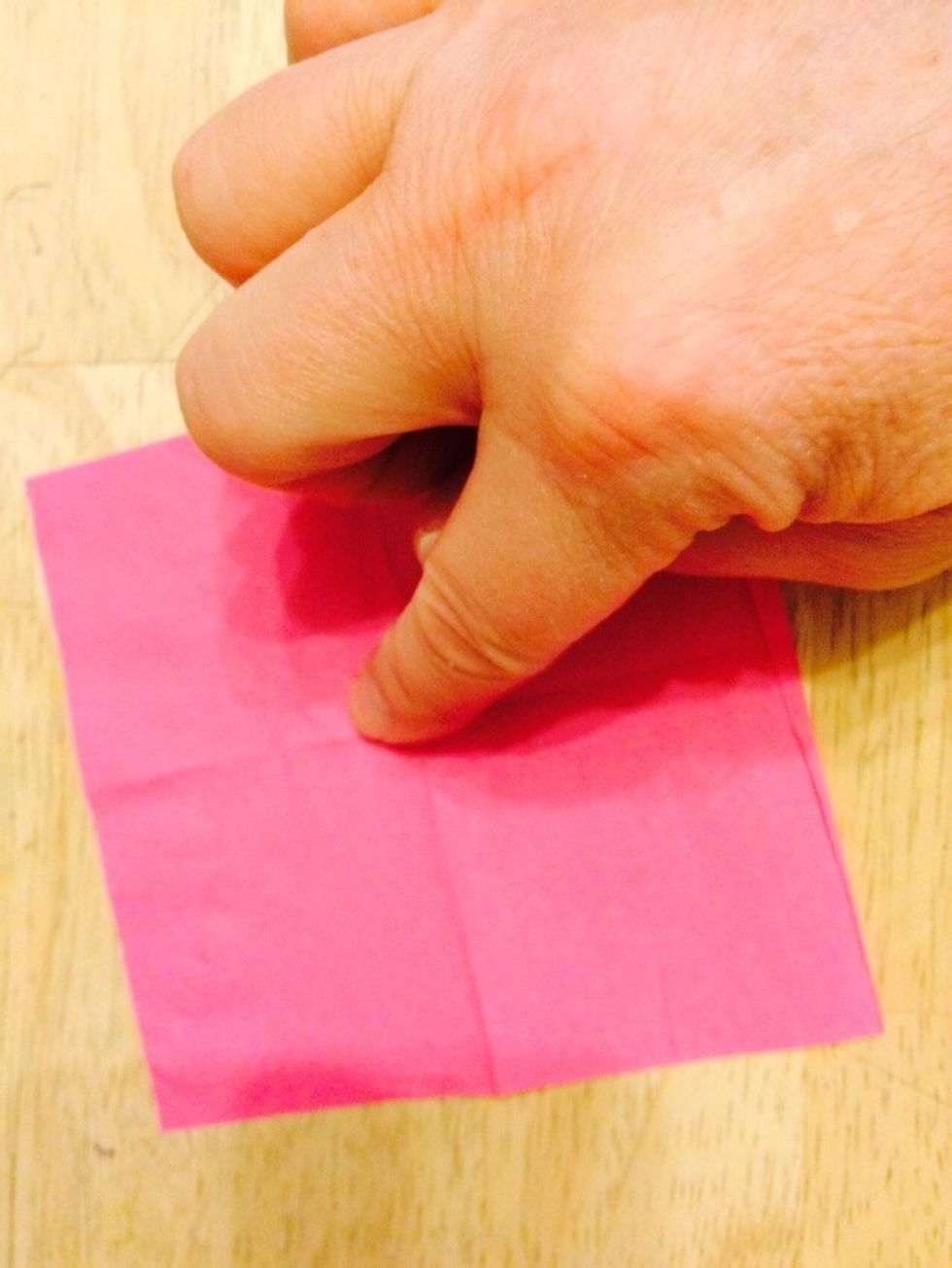 Find the center. And pinch it up.