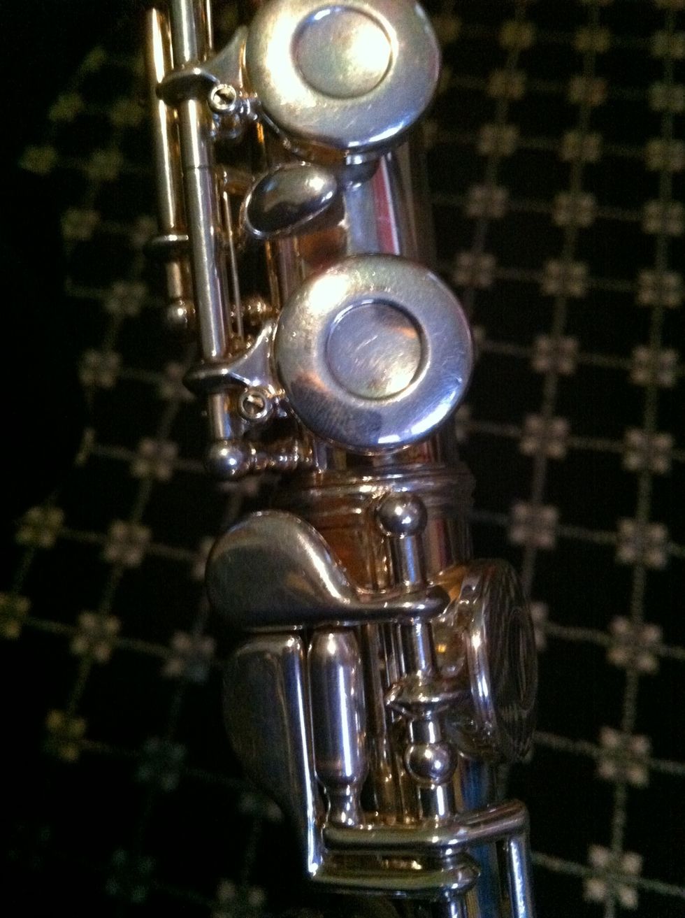 Find the little pole on the end and line it up to the middle of the last key on the long piece