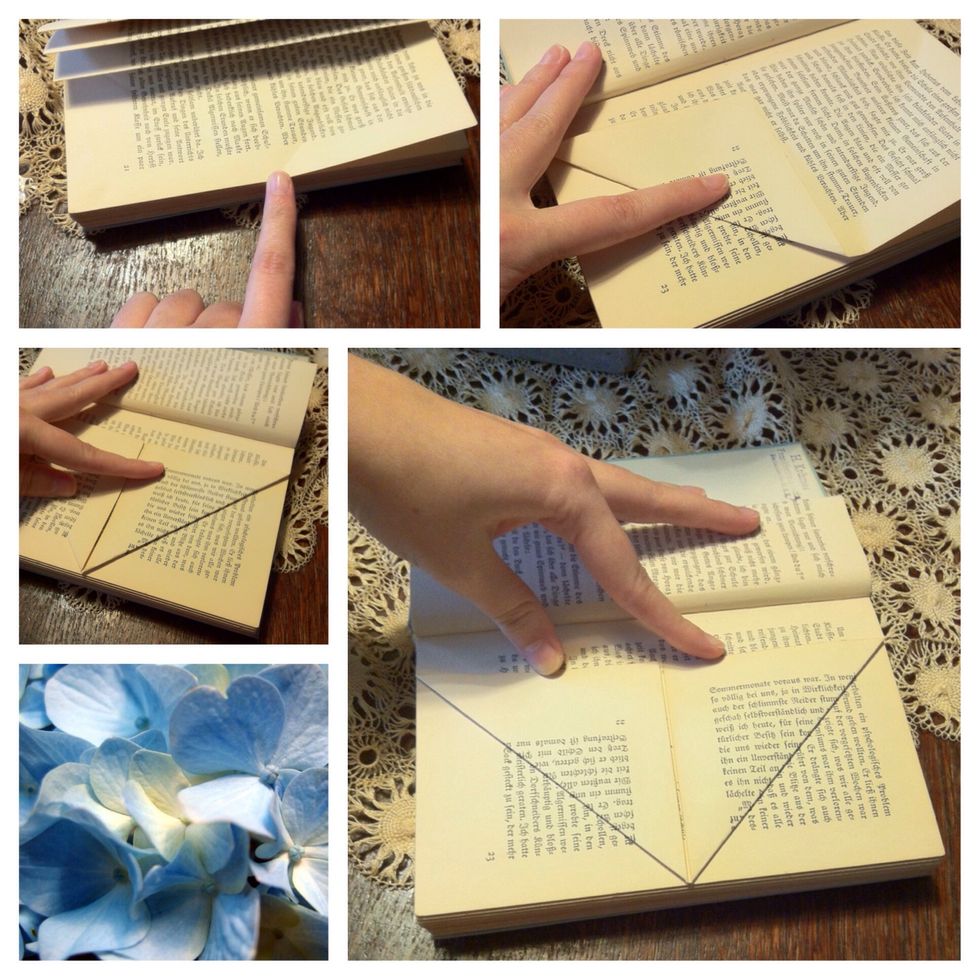 Find the middle of the 11th page and fold a triangle