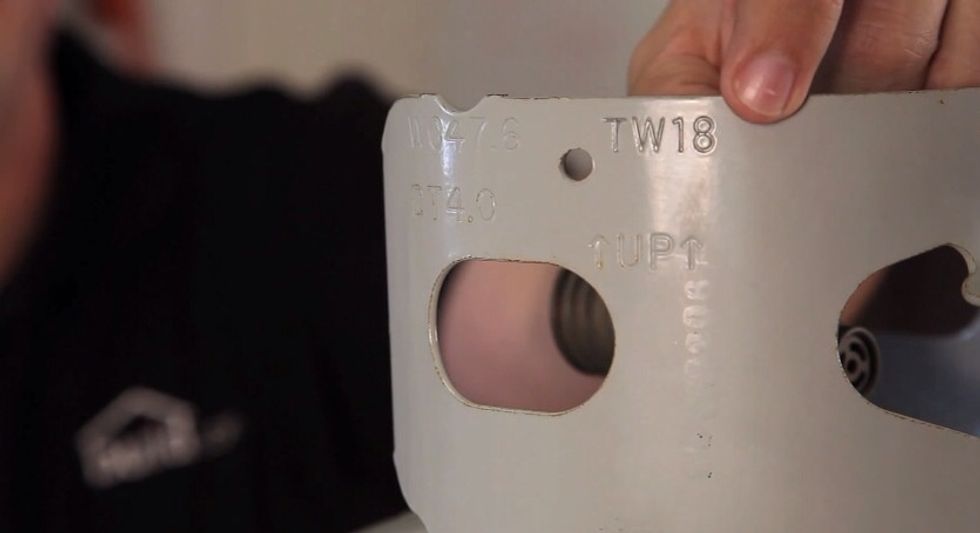 Find the tare weight of the tank, which is how much the cylinder weighs when it\u2019s empty. In this case, the tare weight ("TW") is 18 pounds.