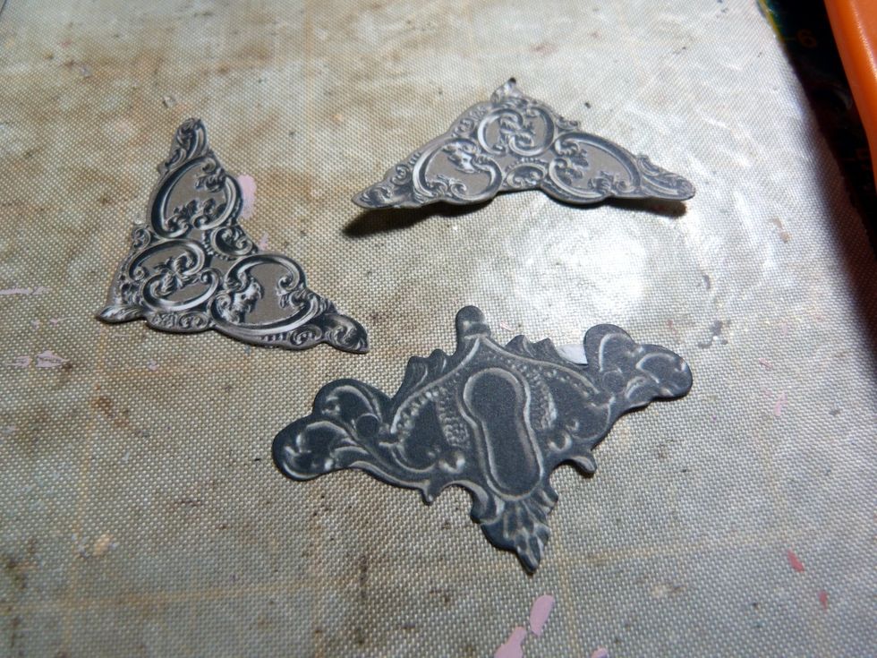 Find these corners and keyhole from the Prima Ephemera, ink edges.