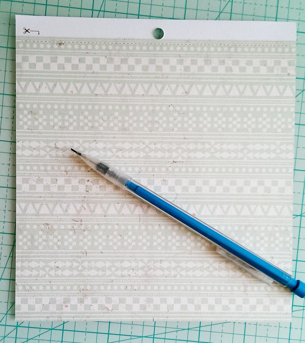 Find this cute print from the Happy Camper 6x6 Paper Pad from www.FotoBella.com. Measure a 6\u201dx3\u201d piece and cut out.