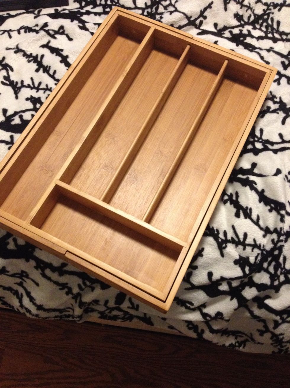 Find you a utensil organizer in the kitchenware section of any of you're local stores.. Mine came from Walmart to be exact.