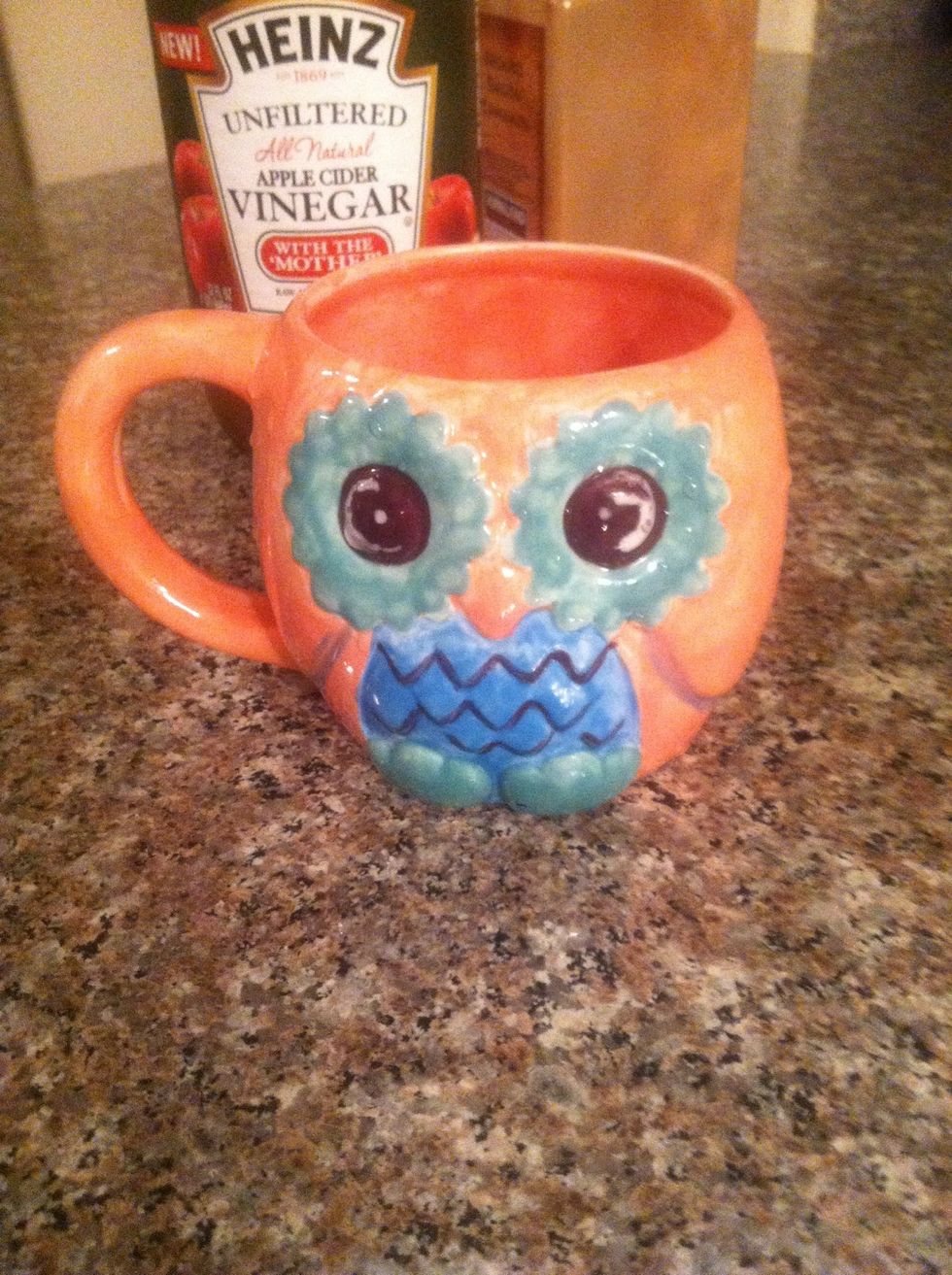 Find your favorite mug and fill it with hot water.