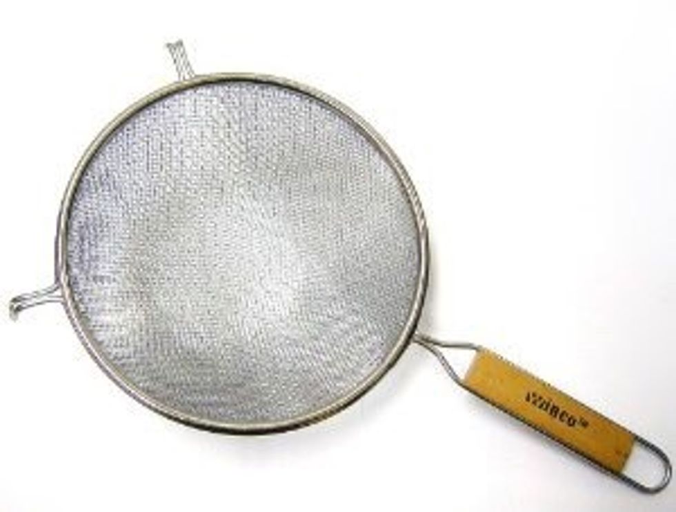 Fine mesh strainer is alike the colander as its use is draining water from pasta, vegetables etc. I can use it when I wash berries
