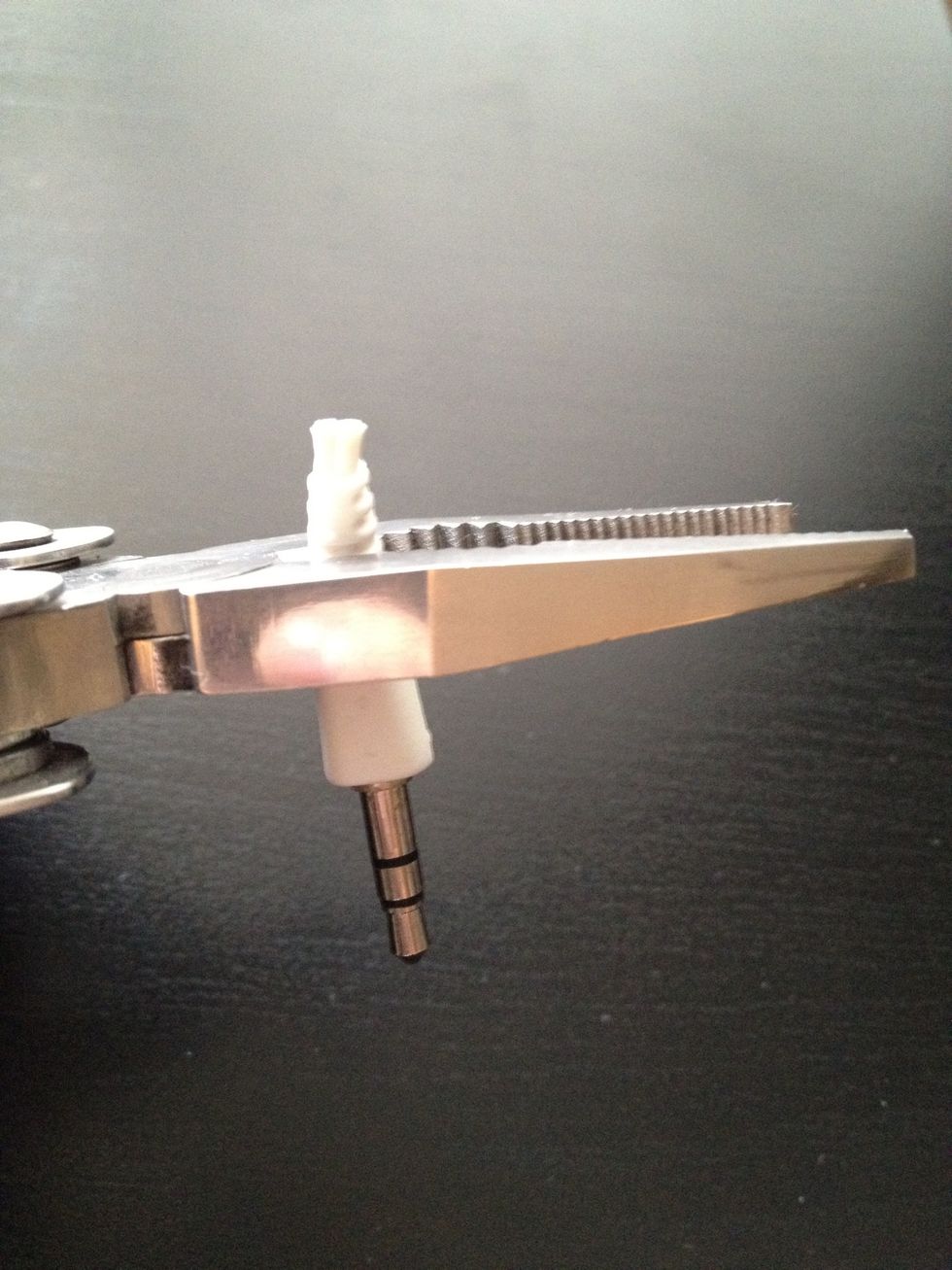 Fine-trim your last cut, but make sure you leave enough plastic to get it out of your phone.