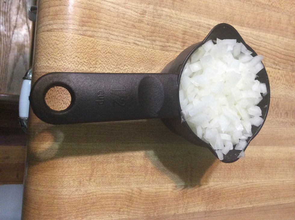 Finely chop 1/2 cup of the onion.