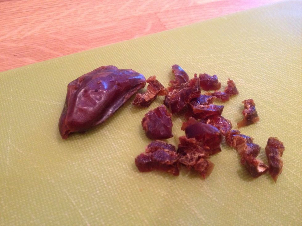 Finely chop a couple of dates