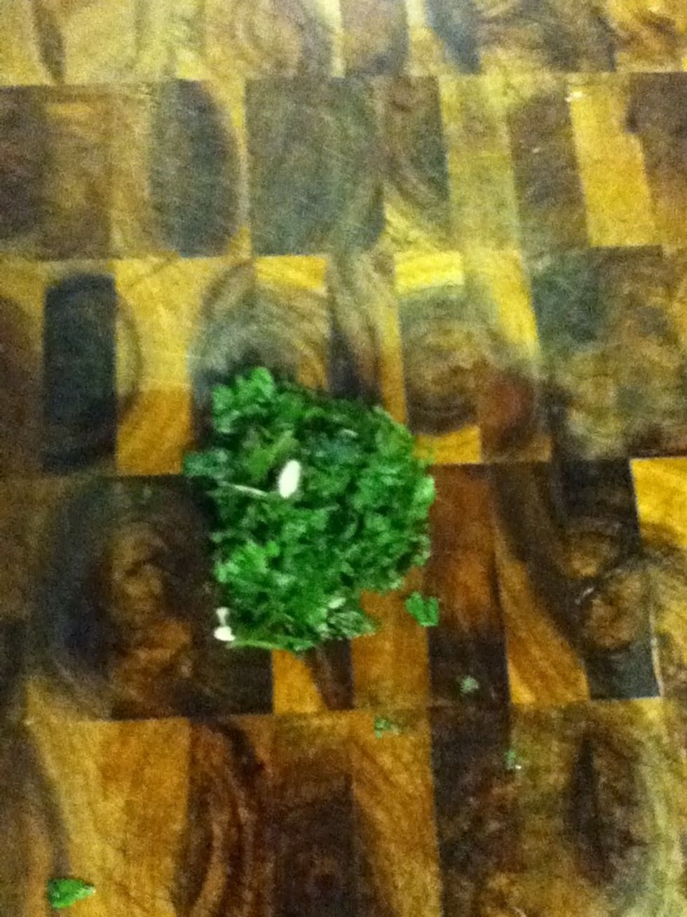 Finely chop a couple sprigs of mint or cilantro...