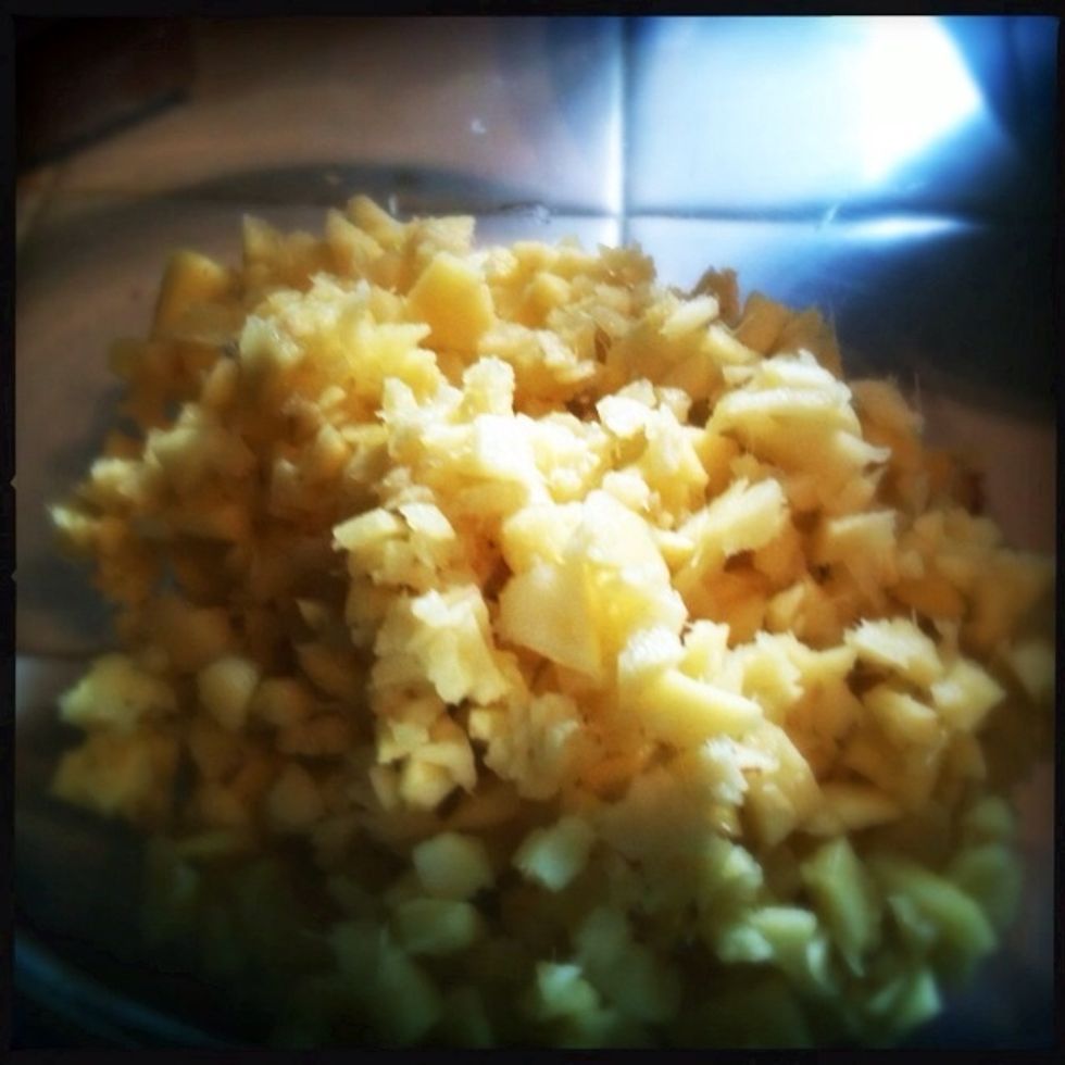Finely chop fresh ginger root.