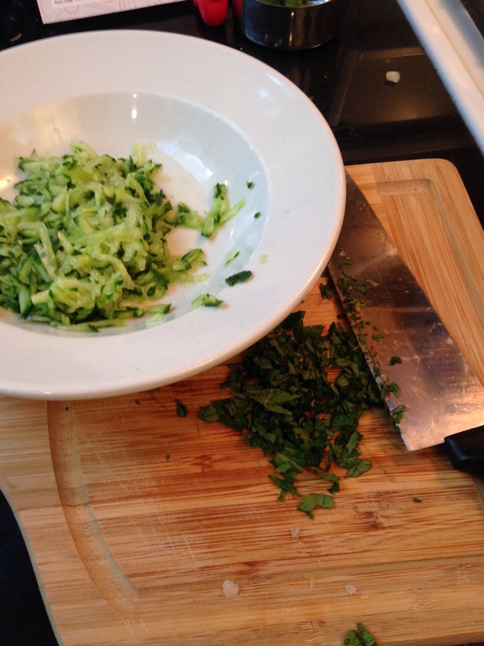 Finely chop half of the mint and add it to half a cup of yogurt and the cucumber