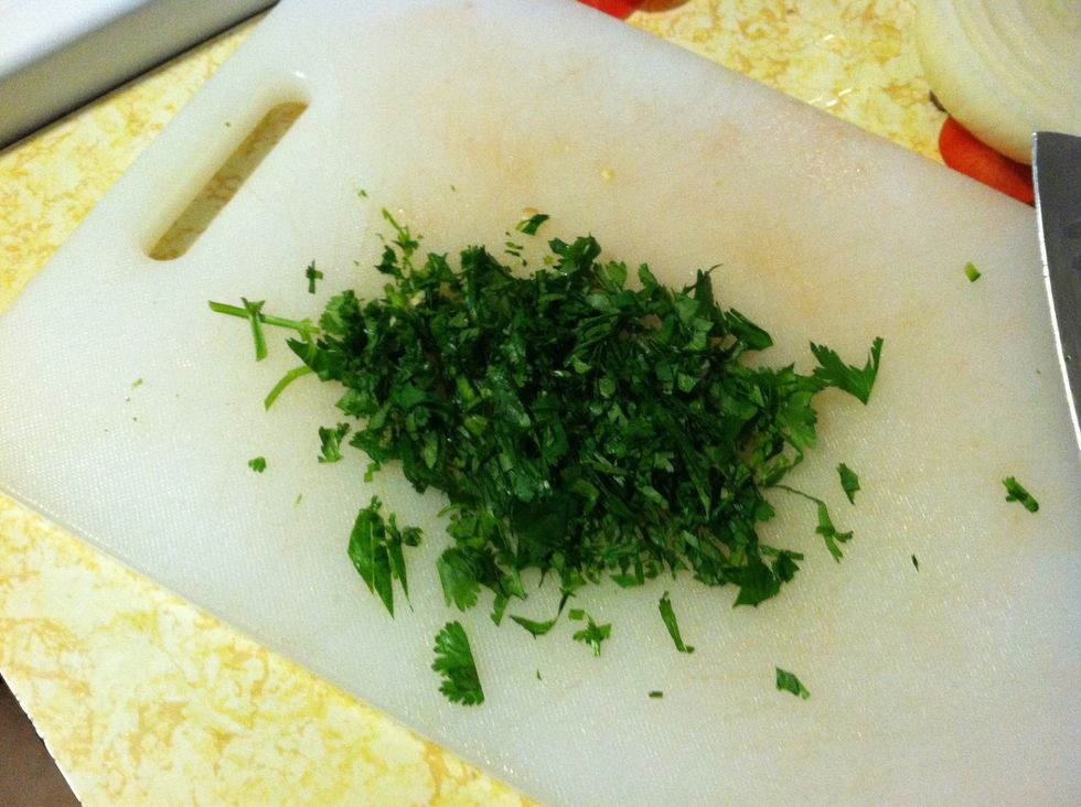 Finely chop the cilantro. Add it to the bowl and mix.