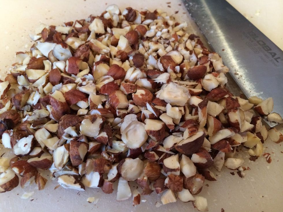 Finely chop the hazelnuts.