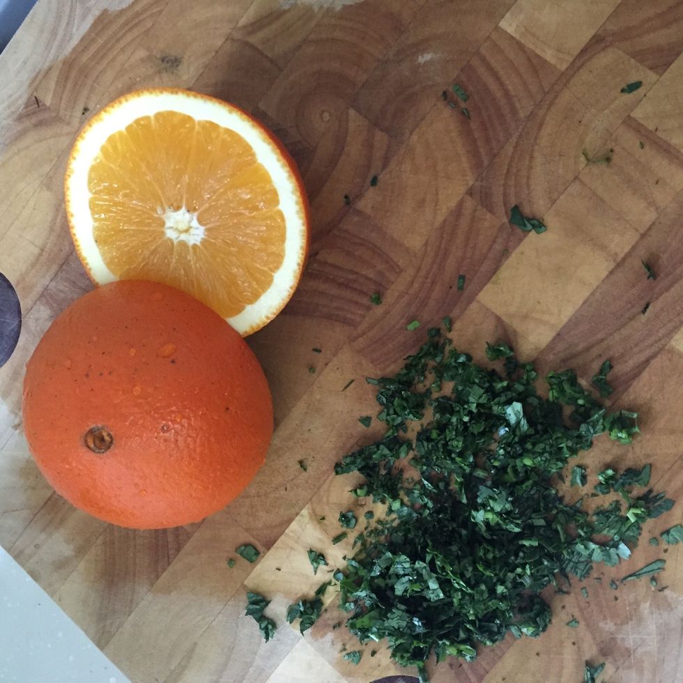 Finely chop the parsley and juice the Orange. Remember to remove the Orange seeds