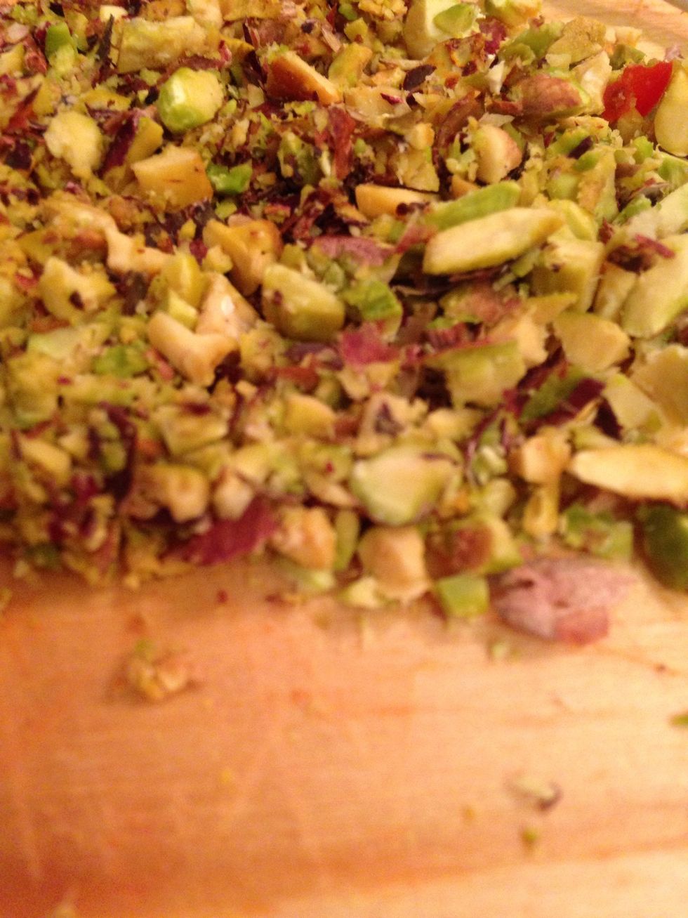Finely chop the pistachios