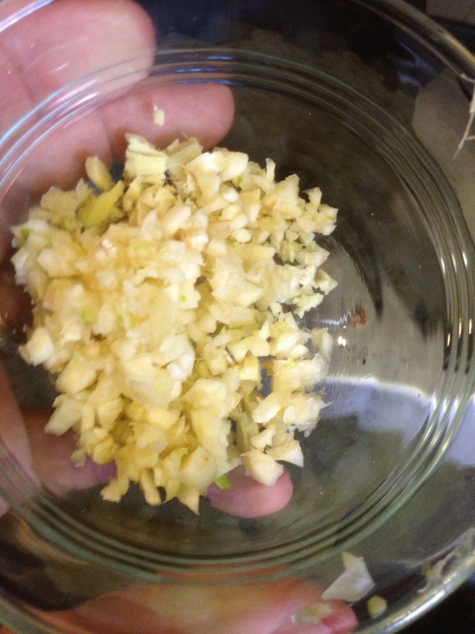Finely chop three cloves of garlic and 2.5cm of ginger.