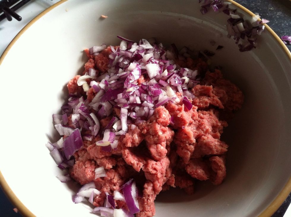Finely chop your red onion and add to meat mixture.