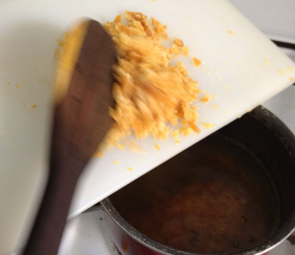 Finely chopped the palm sugar & put them all in the boiling water. If you can't find any palm sugar just like the one I use, brown sugar will do just fine.