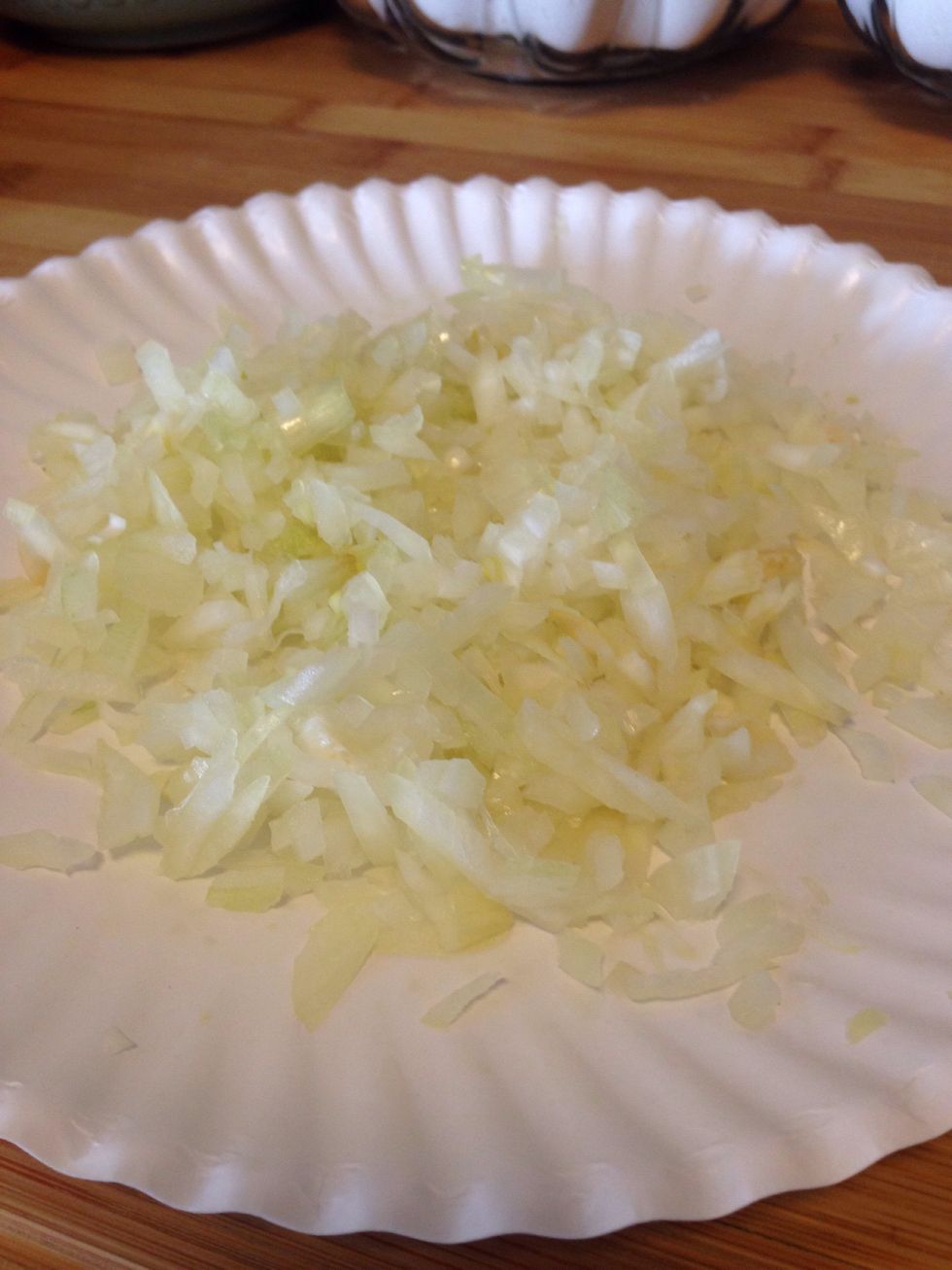 Finely dice 1/2 of an onion (I like yellow onions, but you can use any kind!) and set aside.