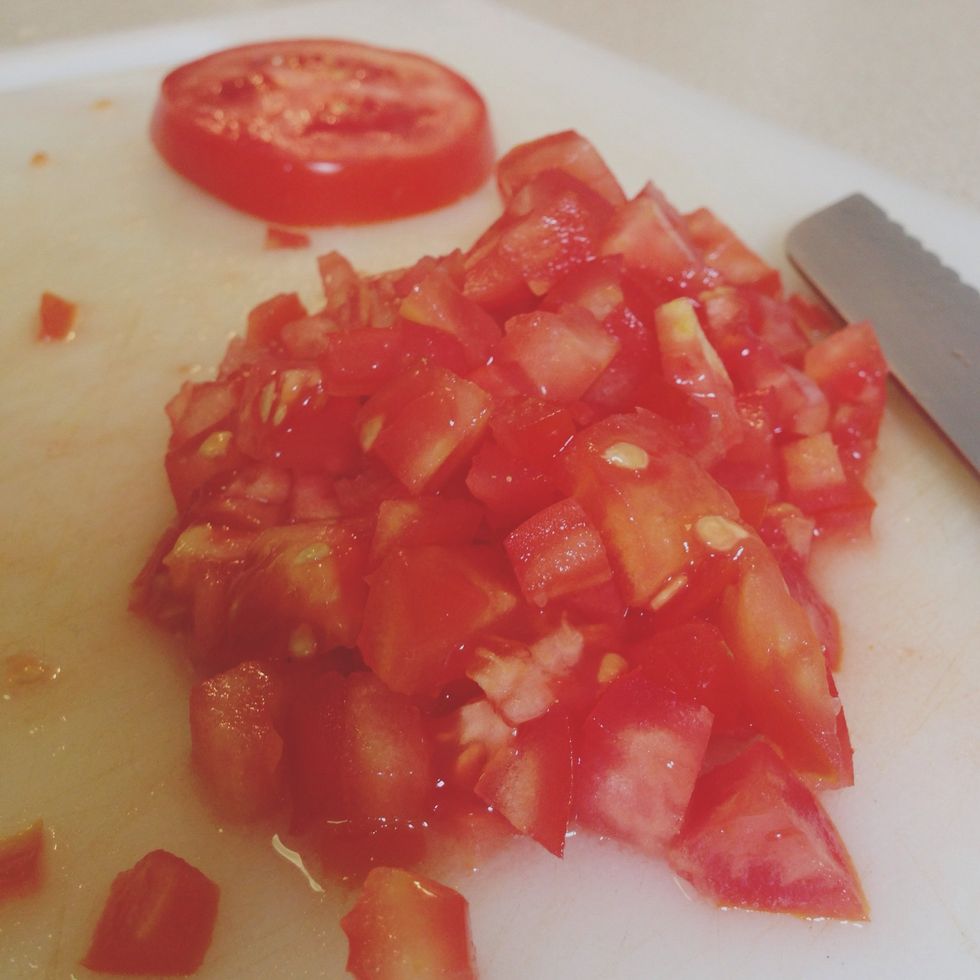 Finely dice one large ripe tomato and add to bowl.