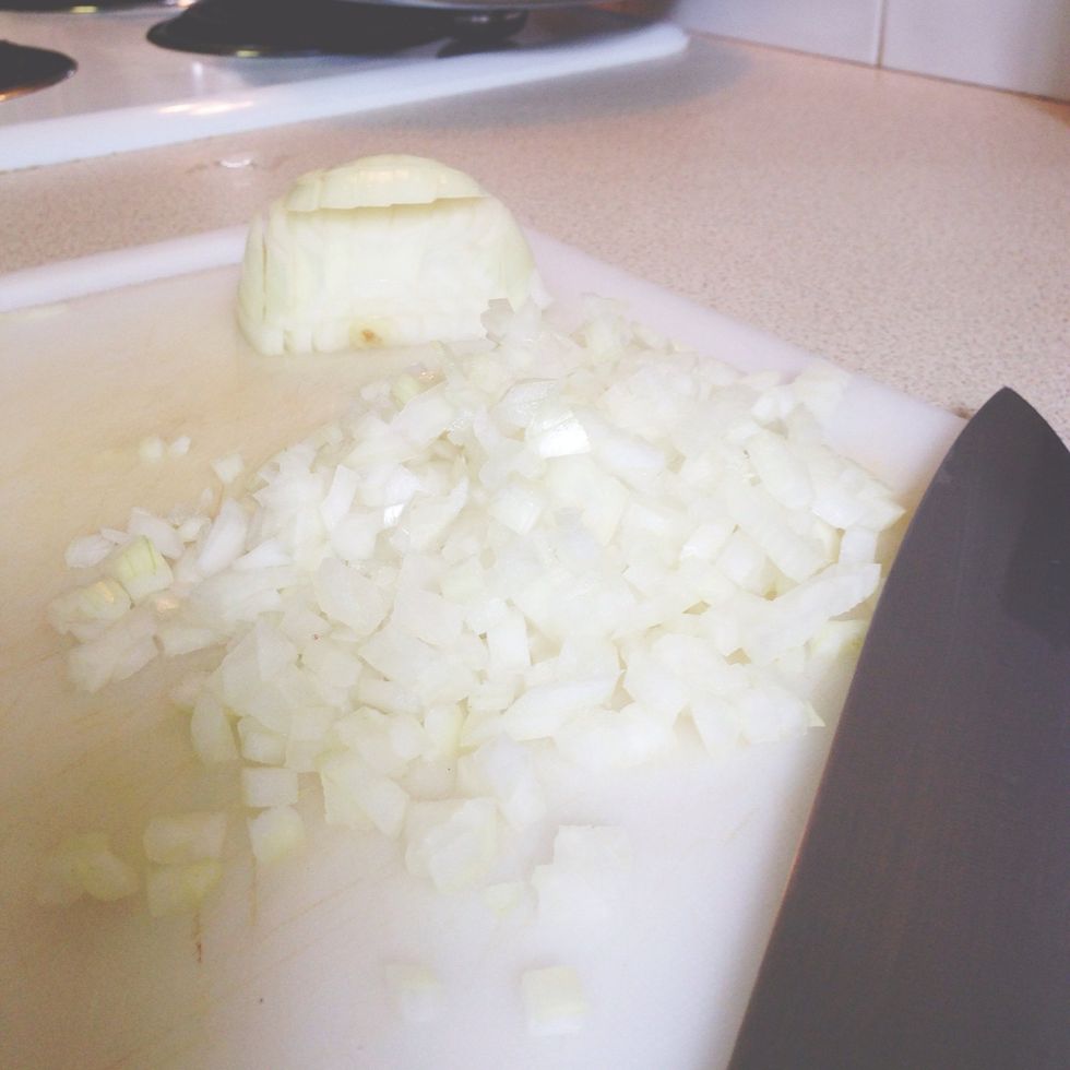 Finely dice one medium onion and place in a large mixing bowl.